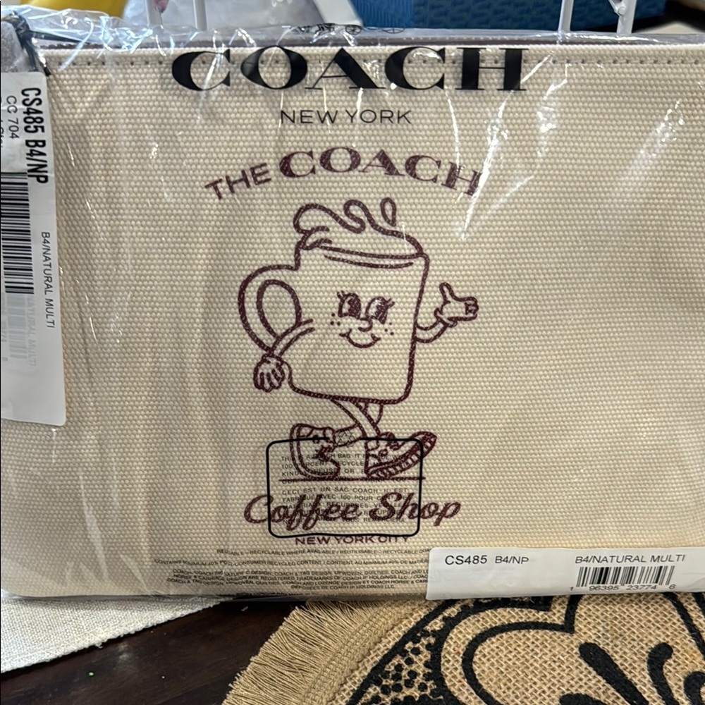 Coach Cream and Purple Clutch